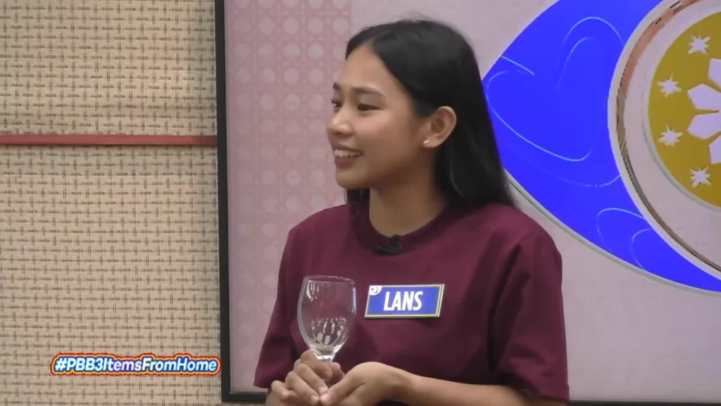 Lans ng PBB Collab 3.0 na hawak ang wine glass mula sa kanilang bahay